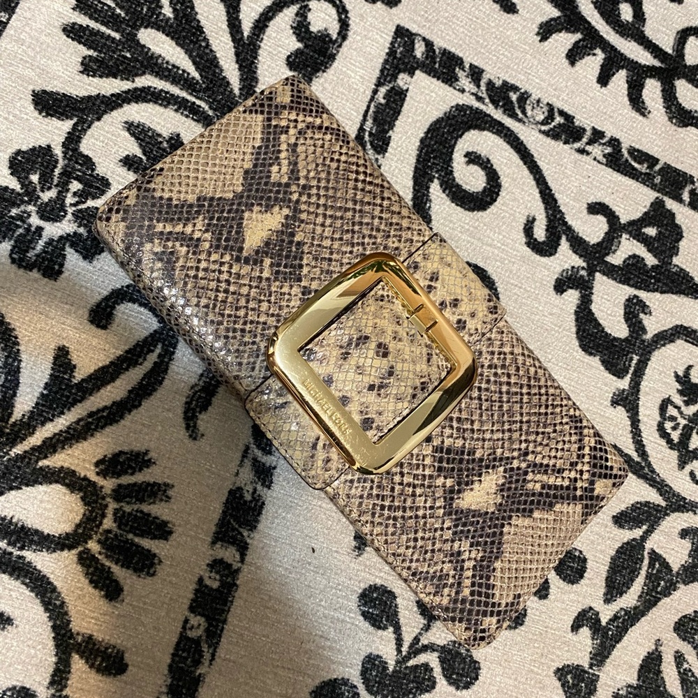 Michael Kors snake skin clutch with buckle